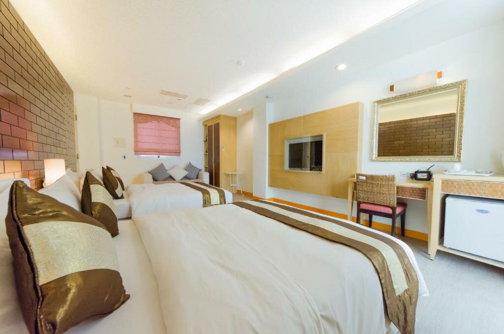 Deluxe quadruple chambre avec balcon et Vue mer Yake Homestay
