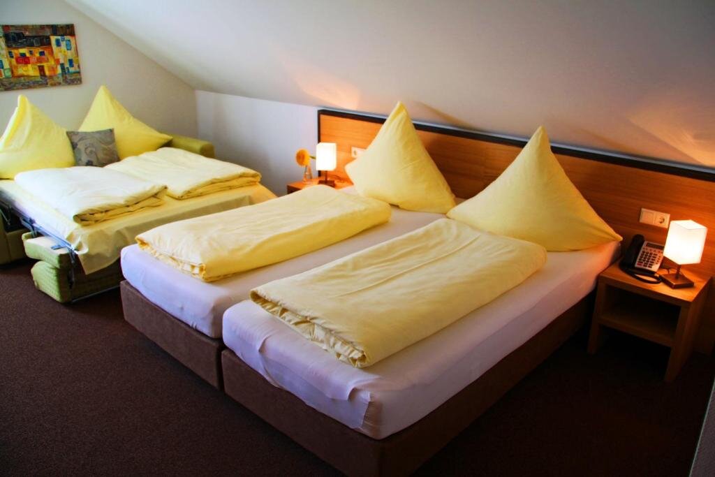 Standard quadruple chambre Hotel Häußler