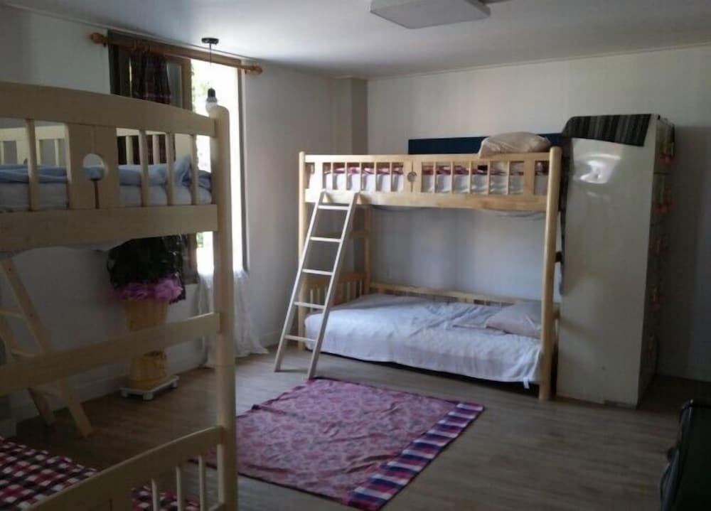 Кровать в общем номере (женский номер) Pohang Youngildae Guesthouse