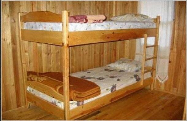 Кровать в общем номере Bayrams Tree Houses