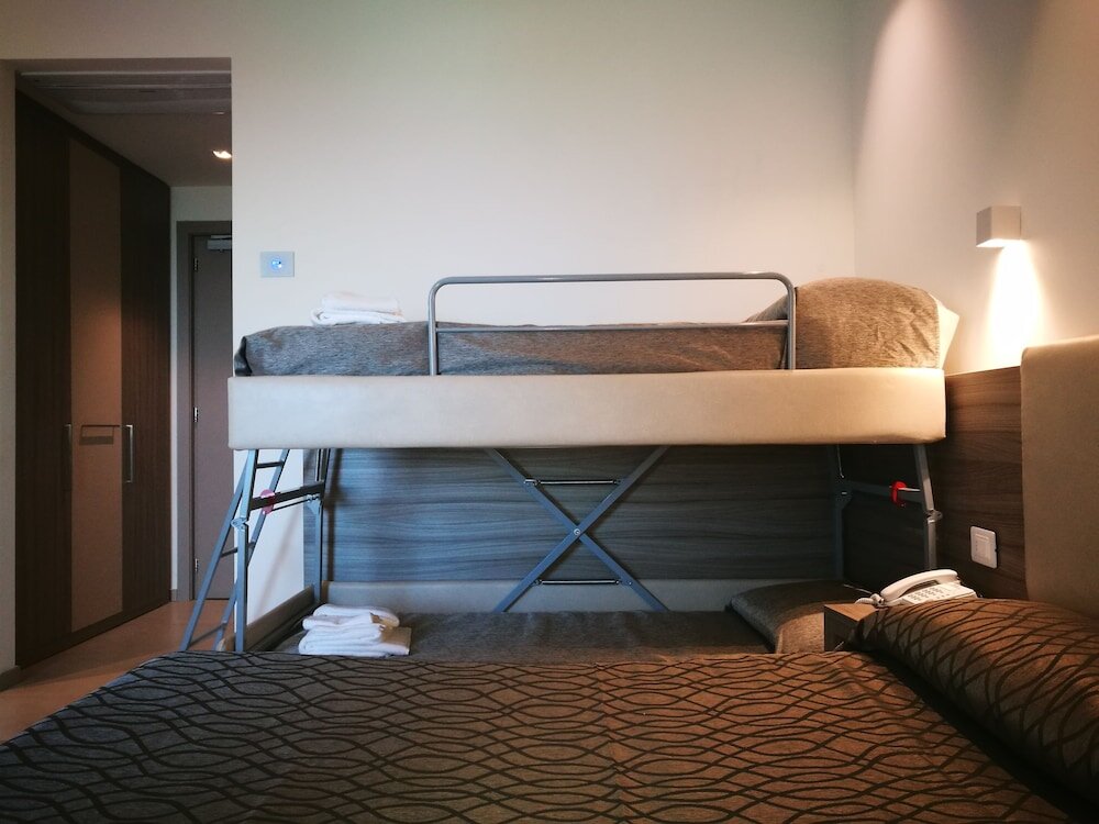 Standard Vierer Zimmer 1 Schlafzimmer mit Balkon und mit Meerblick Hotel Santa Caterina Village Club