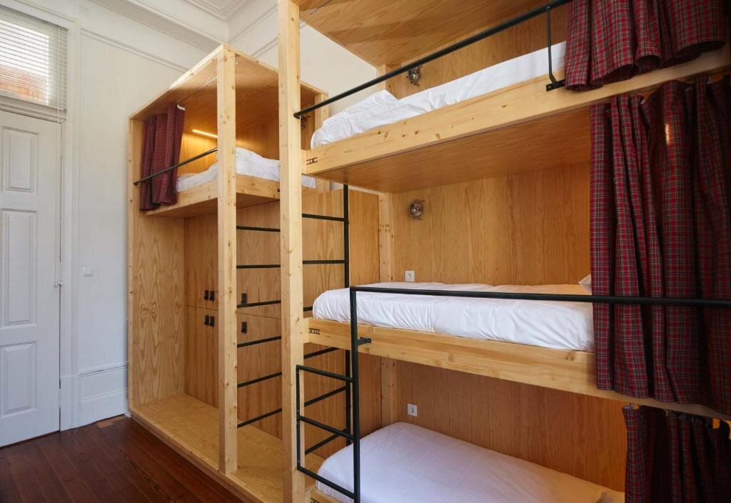 Кровать в общем номере The Passenger Hostel