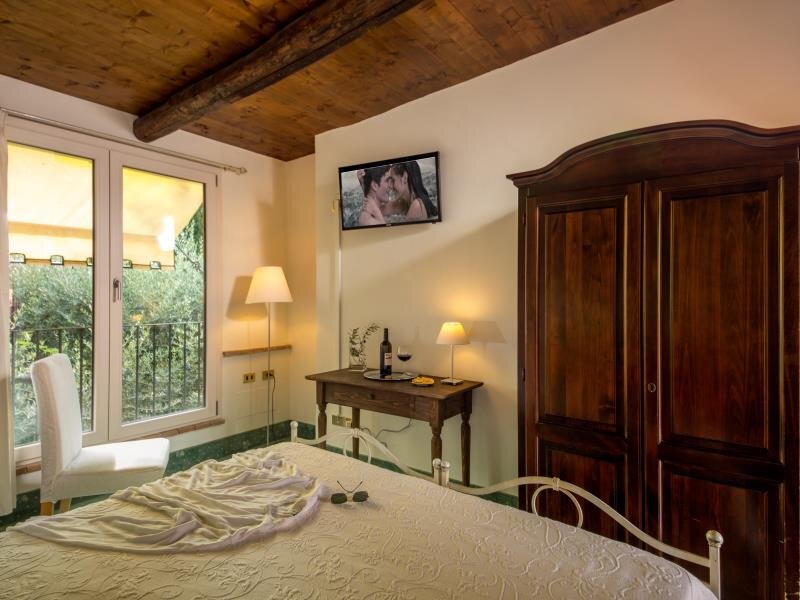 Кровать в общем номере Antica Locanda Palmieri