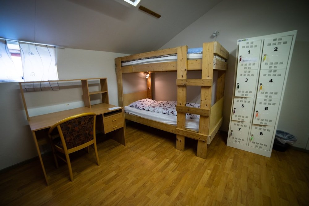 Кровать в общем номере Berg Hostel