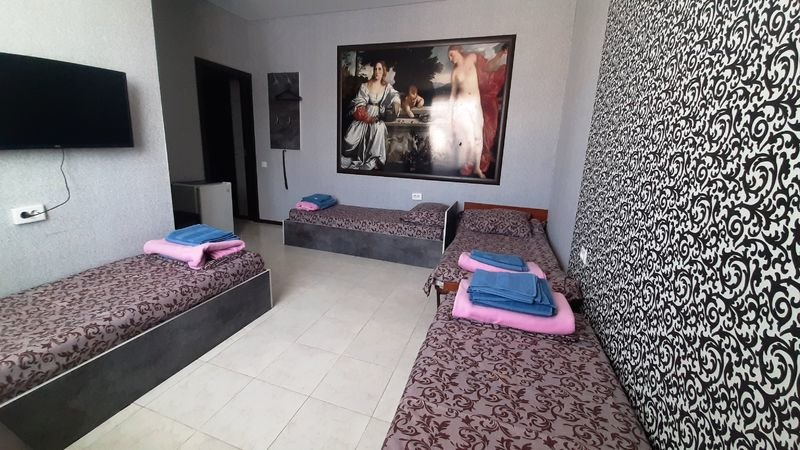 Кровать в общем номере Hotel Arbat