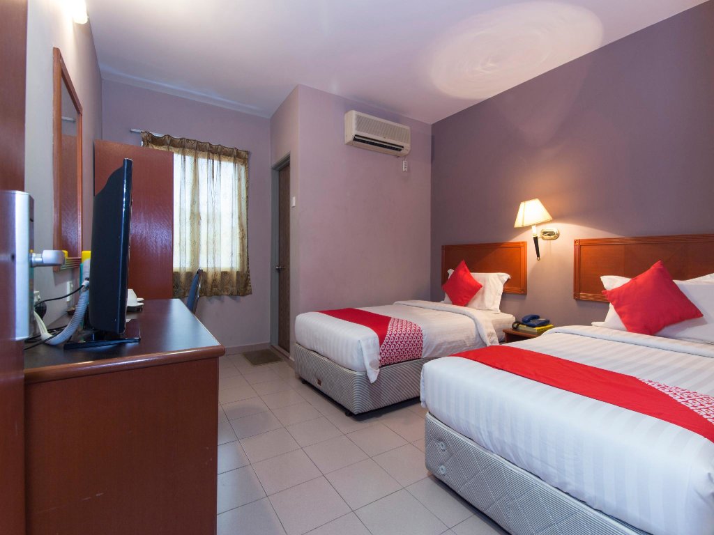 Кровать в общем номере Super OYO 484 Comfort Hotel Kapar