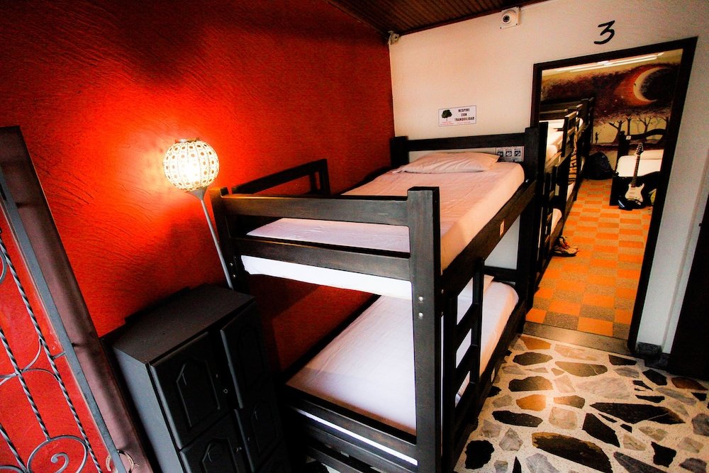 Кровать в общем номере с балконом Casa Quimbaya