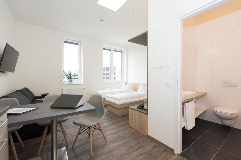 Апартаменты Comfort TT-ROOMS - kontaktlos mit Self Check-in