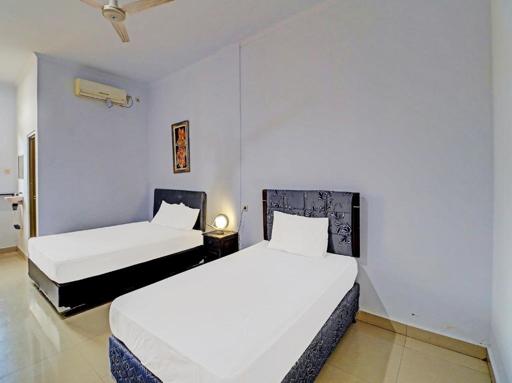 Suite Capital O 92094 Hotel Kertha