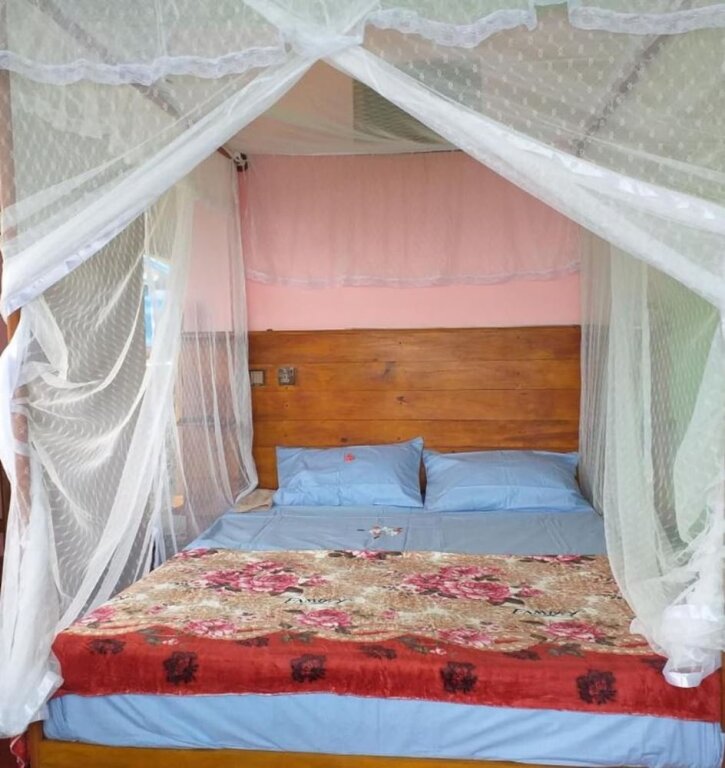 Кровать в общем номере AURORA village INN haputale srilanka