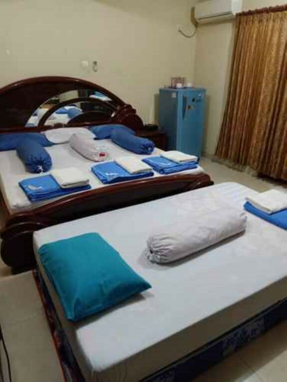 Deluxe Zimmer Eline Guesthouse Syariah