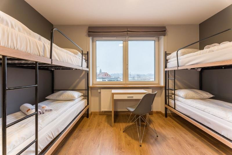 Кровать в общем номере с балконом AMEN Aparthotel Residence