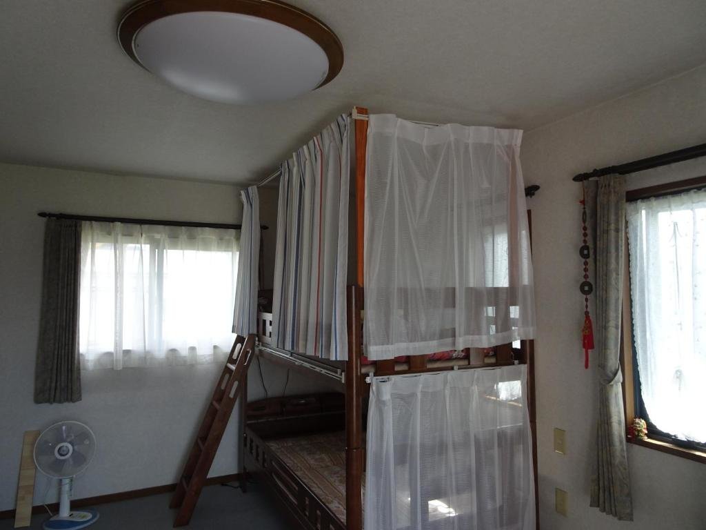 Кровать в общем номере (женский номер) Guesthouse Gifu SUAI