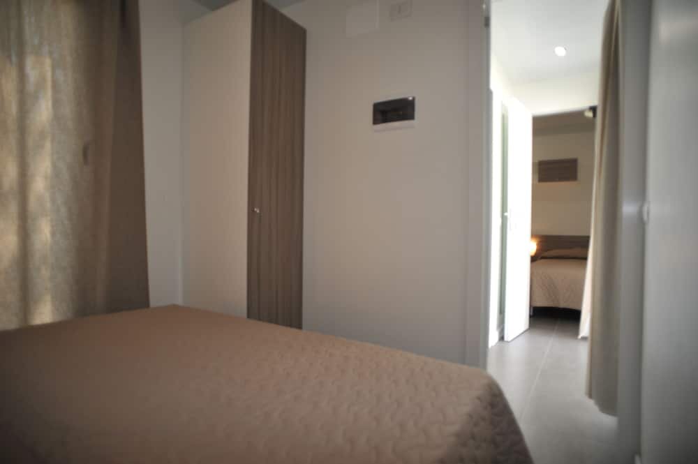 Standard Familie Zimmer 2 Schlafzimmer mit eingeschränktem Meerblick Villaggio Le Diomedee