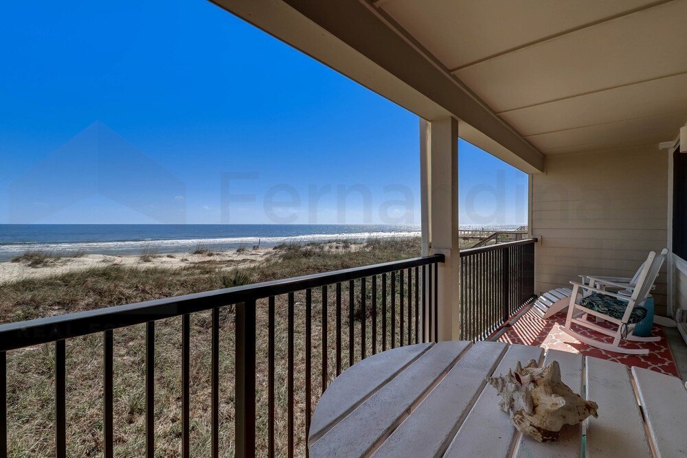 Camera Standard Beach Style Condo Includes Google Mini Home And Beach Access 2 Bedroom Condo by RedAwning