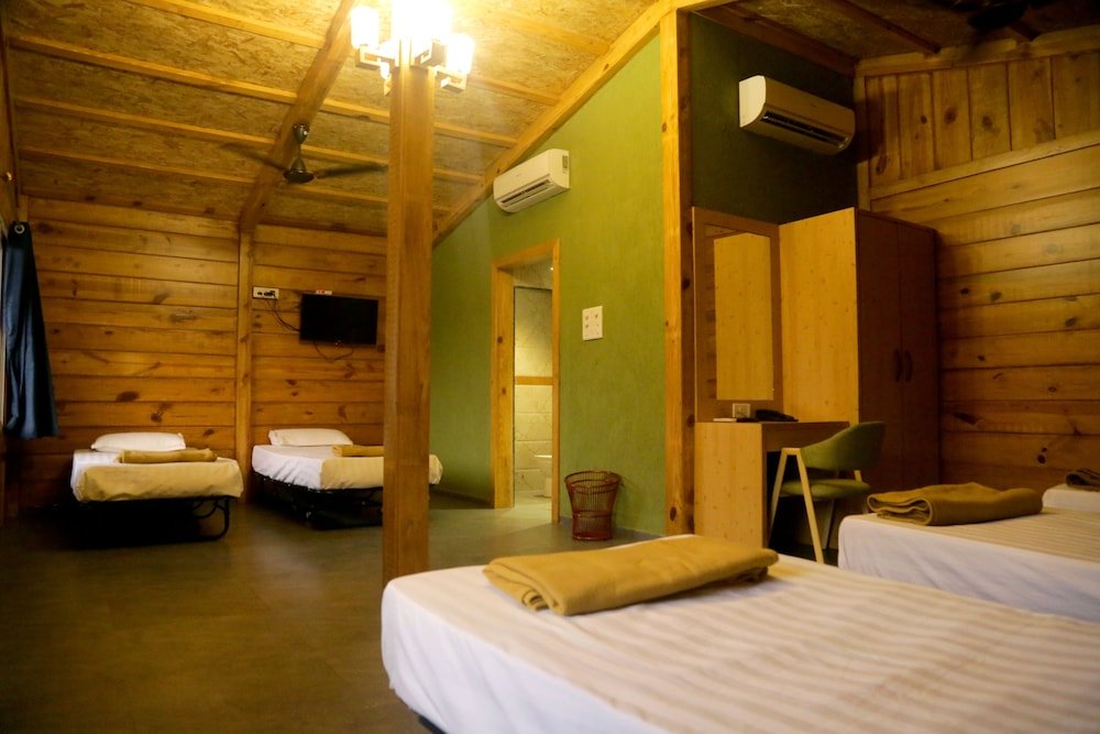 Cama en dormitorio compartido Sai River Resort