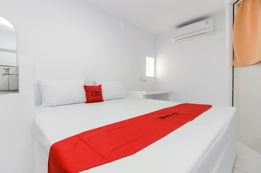 Cama en dormitorio compartido RedDoorz near Margo City