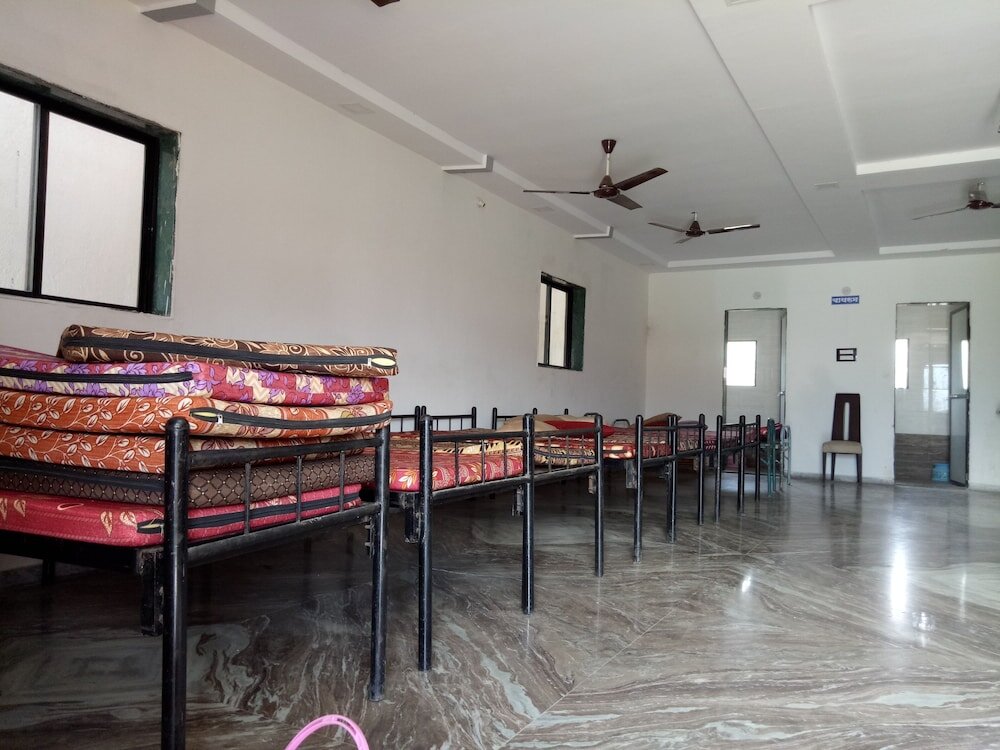 Cama en dormitorio compartido Malshej Agro Resort - Hostel