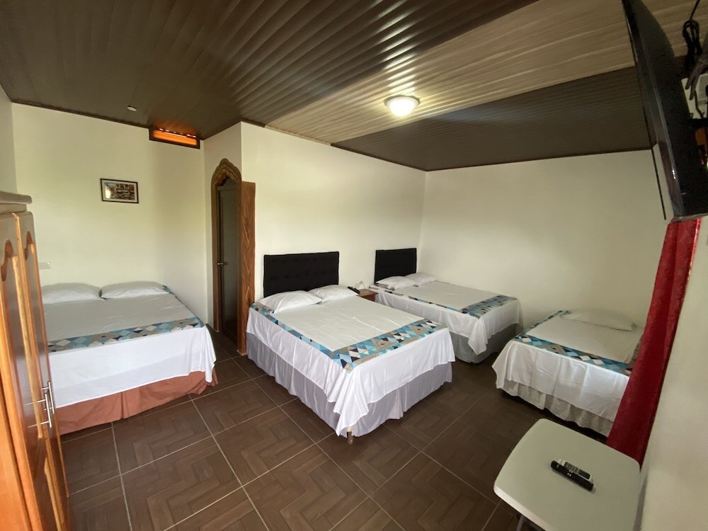 Standard Quadruple Family room with garden view Hotel y Restaurante Las Adas y Estrellas