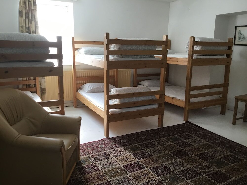 Кровать в общем номере The Boathouse Lodge Hostel