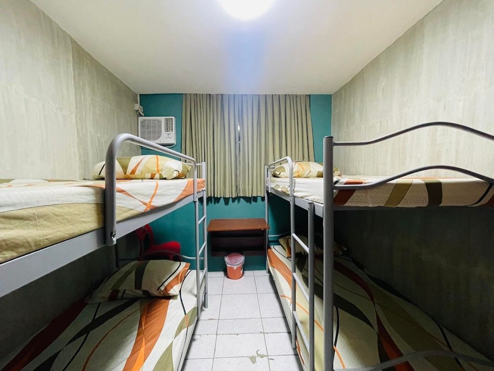 Cama en dormitorio compartido OYO 925 Rcee Place