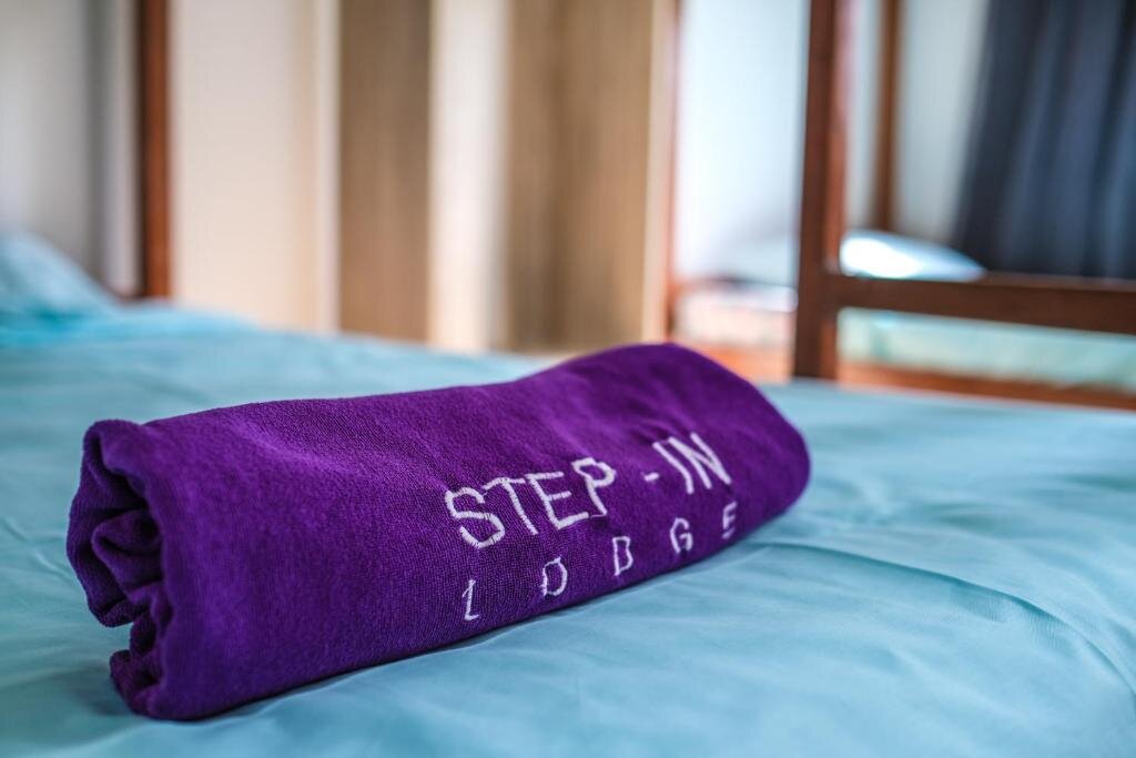 Cama en dormitorio compartido Step-in Lodge