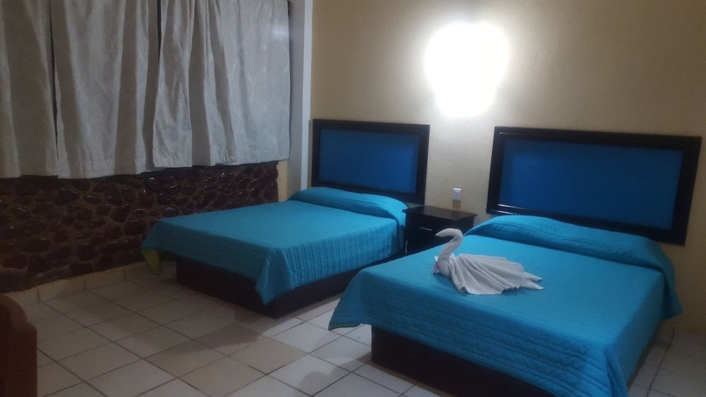 Standard Quadruple room Hotel Rio Maya