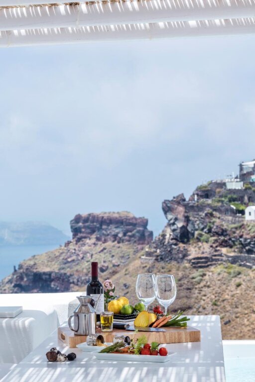 Номер Standard с балконом Katikies Chromata Santorini - The Leading Hotels of the World