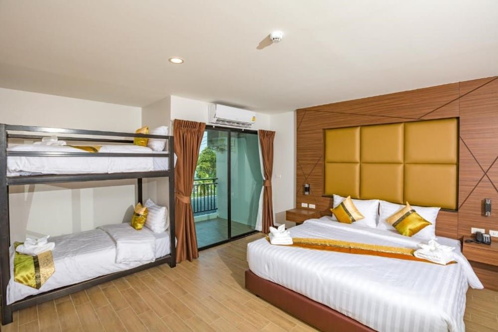 Семейный люкс с балконом The Bell Airport Phuket Hotel - SHA Extra Plus