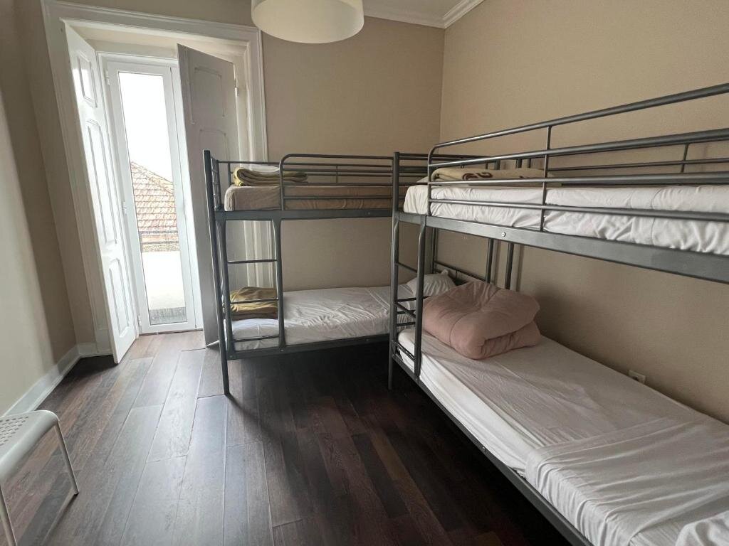 Кровать в общем номере Suites & Apartments DP VFXira