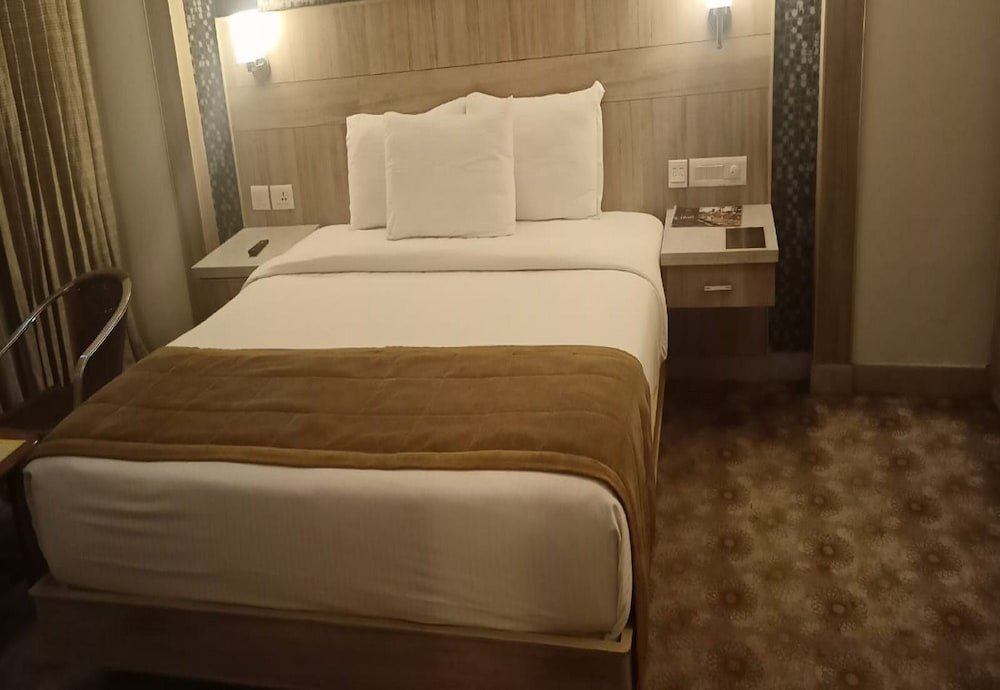Deluxe chambre Hotel Suruli Pallazzio