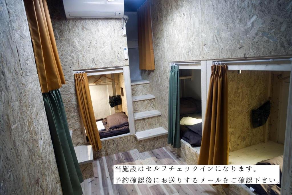 Cama en dormitorio compartido WORLDTRECK DINER & GUESTHOUSE - Pise - Hostel