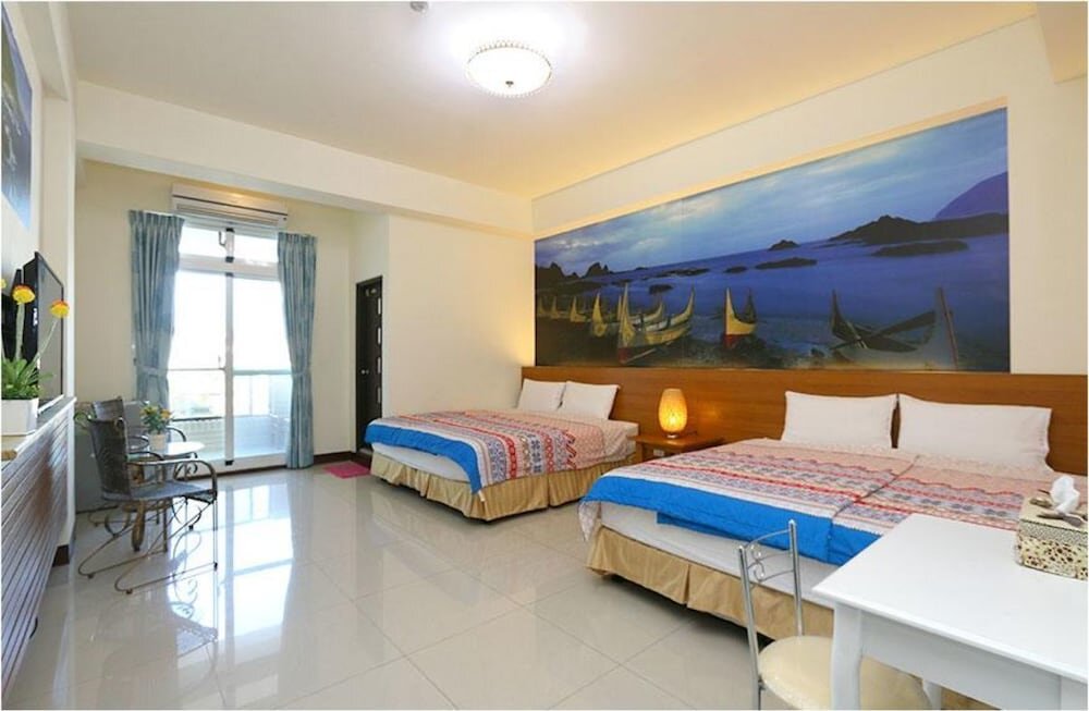 Habitación cuádruple Estándar con balcón Sweet Home in Taitung