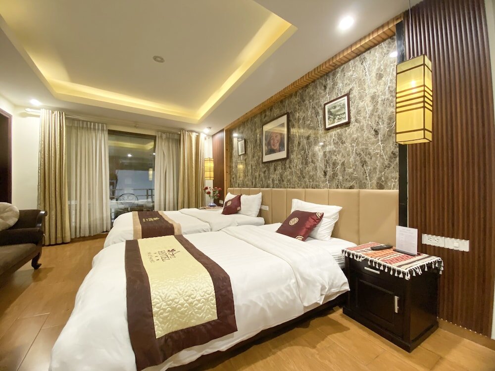 Luxe triple chambre Vue sur la ville Art Hotel Ha Noi