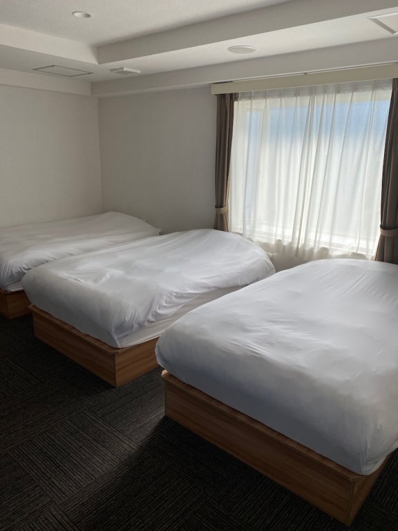 Standard triple chambre HOTEL WILL Urawa