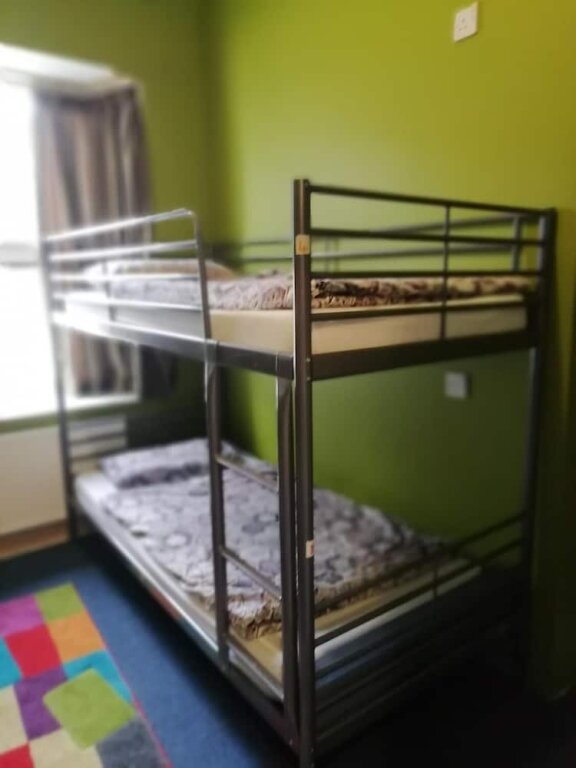 Кровать в общем номере MacGabhainns Backpackers Hostel