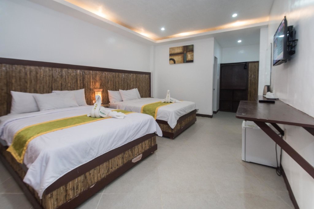 Standard quadruple chambre Bamboo Beach Resort