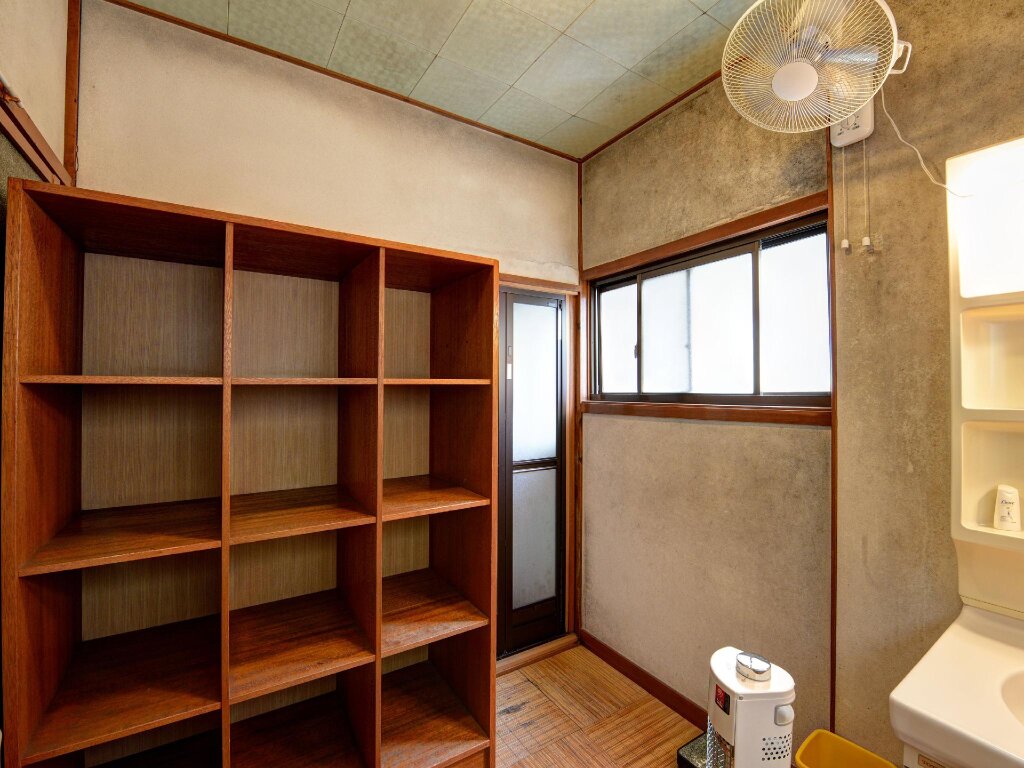 Cama en dormitorio compartido Ryokan Sakamotoya