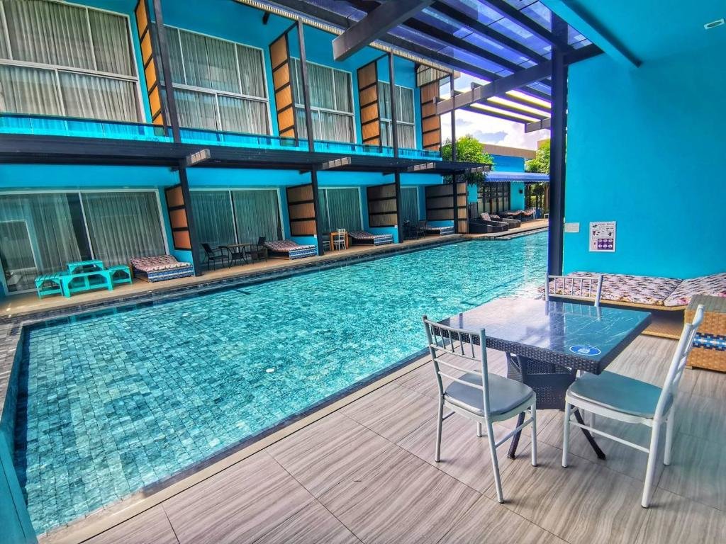 Suite junior con vista a la piscina Sikhara Plago Resort