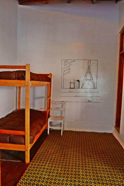 Кровать в общем номере Hostal Chaska Wasi