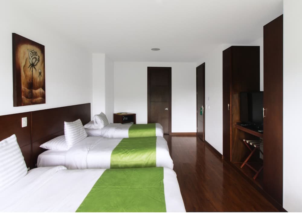 Standard Quadruple room Hotel Macao Colombia