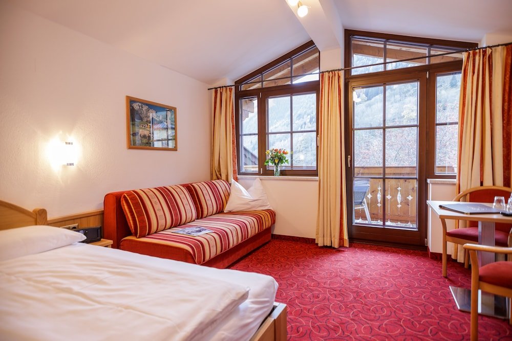 Standard quadruple chambre avec balcon et Vue montagne Feriendorf Ponyhof