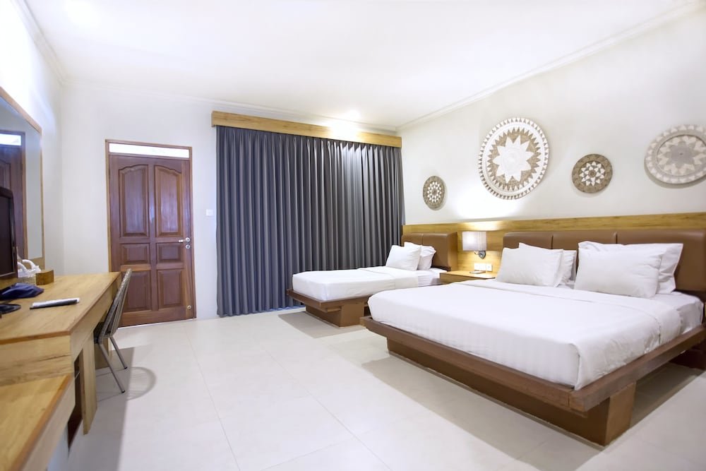Standard Single Family room with balcony Mutiara Bali Boutique Resort & Villa