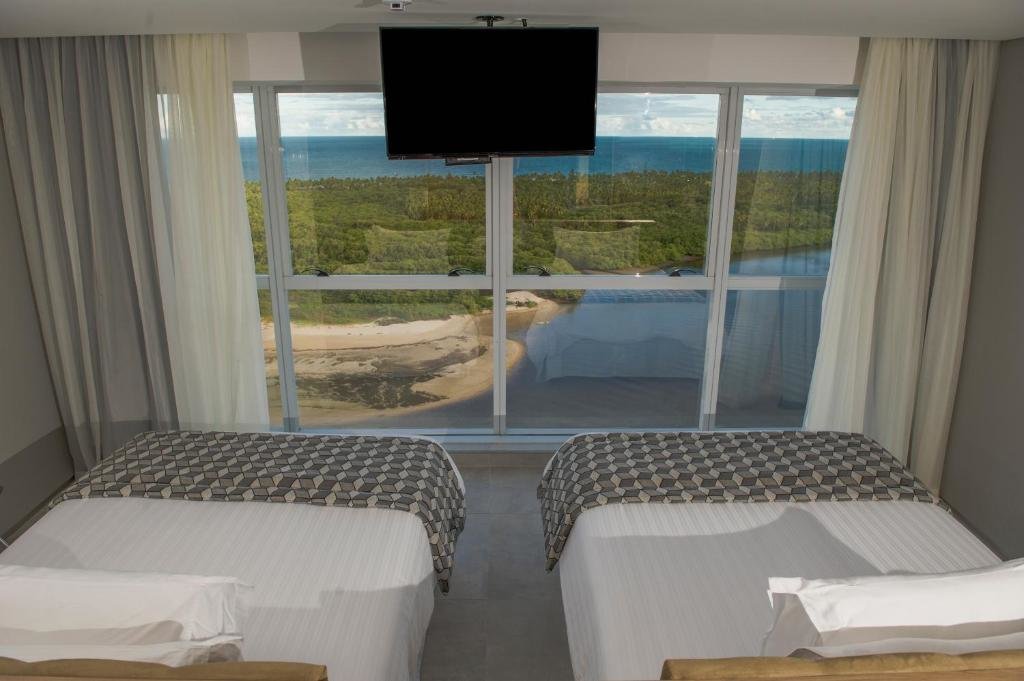 Habitación triple Estándar con vista al mar Silverton Paiva Experience - Flat