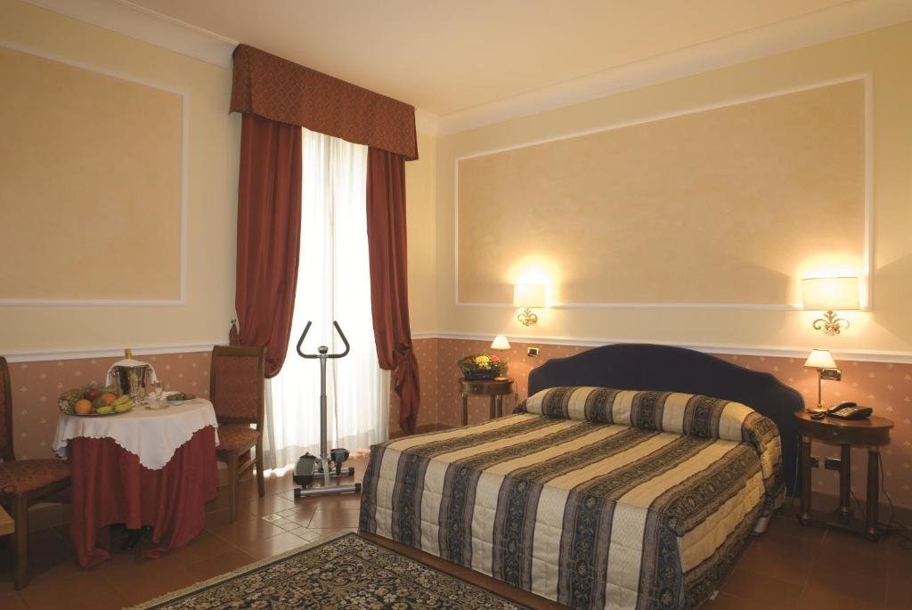 Четырёхместный номер Relais Hotel Antico Palazzo Rospigliosi