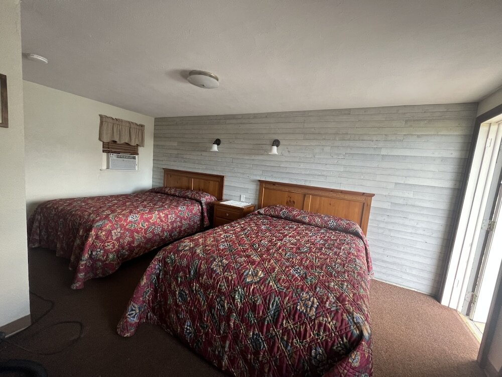 Standard quadruple chambre Boulevard Motel