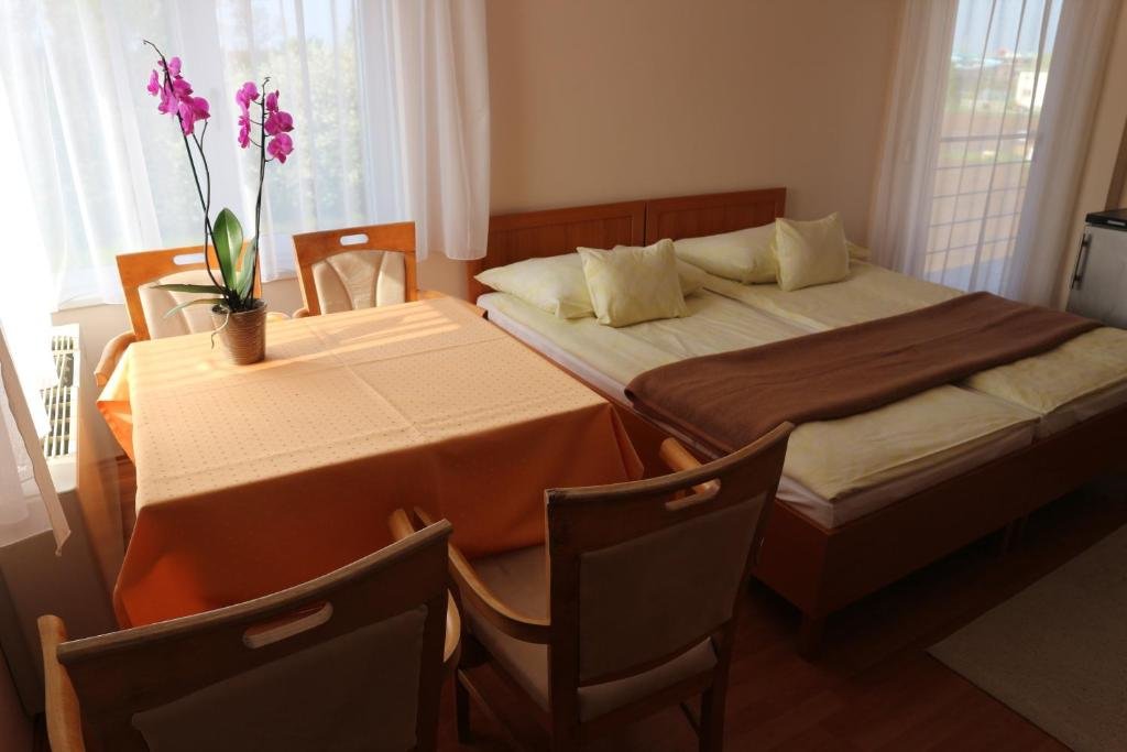 Confort quadruple chambre Wellness Hotel-M - Hajdúszoboszló
