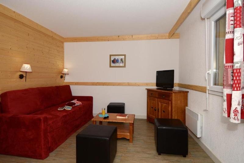 Кровать в общем номере с 3 комнатами Résidence Odalys Les Bergers