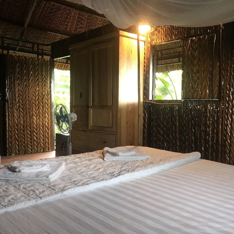 Deluxe quadruple chambre avec balcon et Vue sur la rivière Hometravel Mekong Can Tho