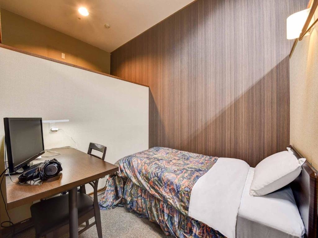 Кровать в общем номере (мужской номер) Sagayamato Onsen Hotel Amandi